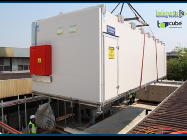 Modular data centre unit being craned into position